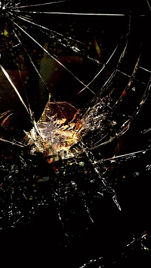 Image "A broken phone screen with lots of cracks" (1536x2730)