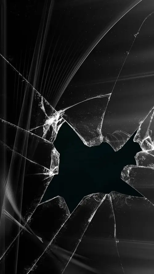Image "Broken glass with sharp edges and cracks radiating from the central hole" (1440x2560)