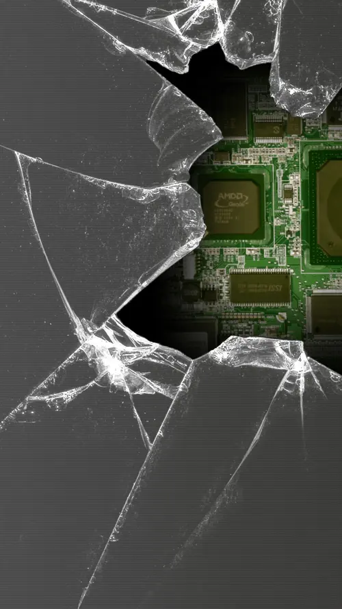 Image "A broken screen with a view of the motherboard and AMD processor" (1080x1920)
