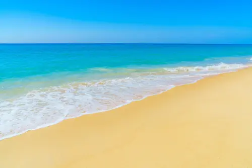 Image "A beautiful beach with golden sand and turquoise sea" (2939x1960)