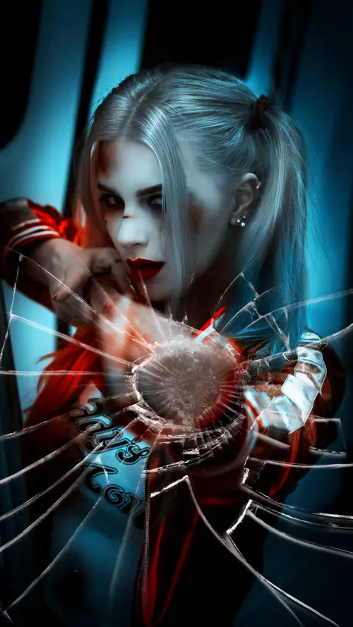 Image "Harley Quinn smashes a broken screen" (1080x1920)