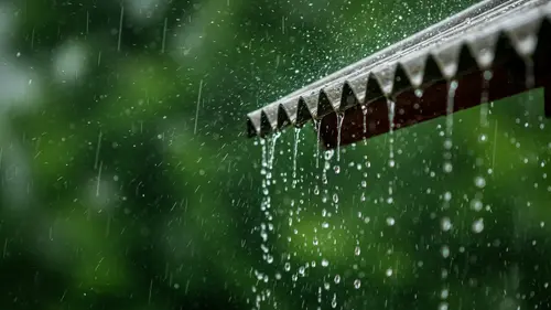 Image "Rain running down the edge of the roof" (1920x1080)