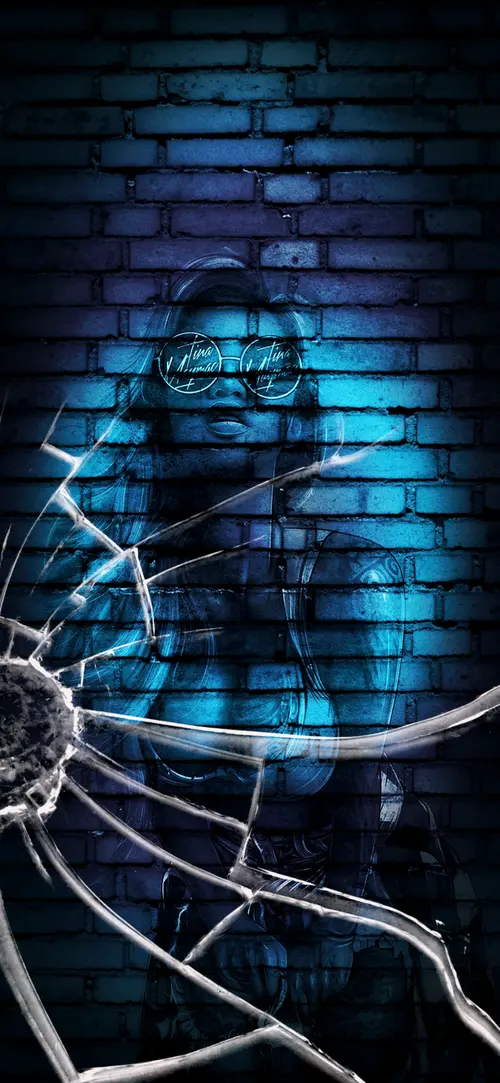 Image "A girl with glasses against a blue brick wall with broken glass" (1080x2340)