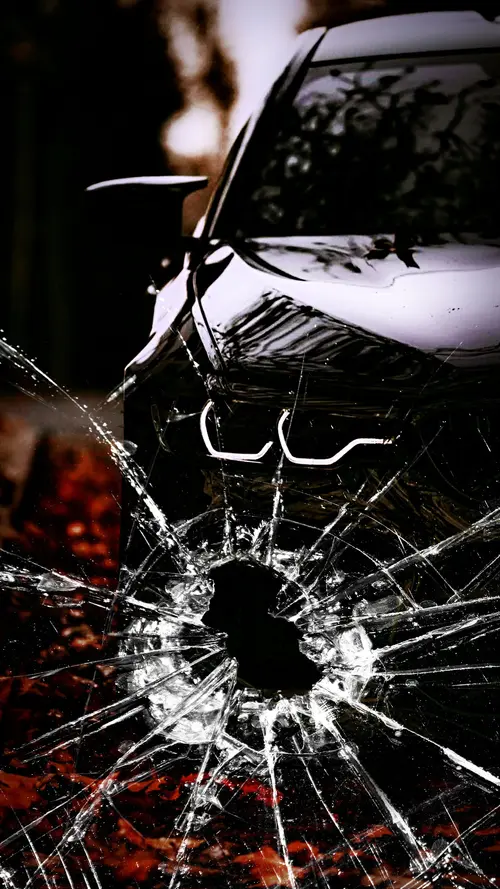 Image "A broken screen with a car as a wallpaper" (1080x1920)